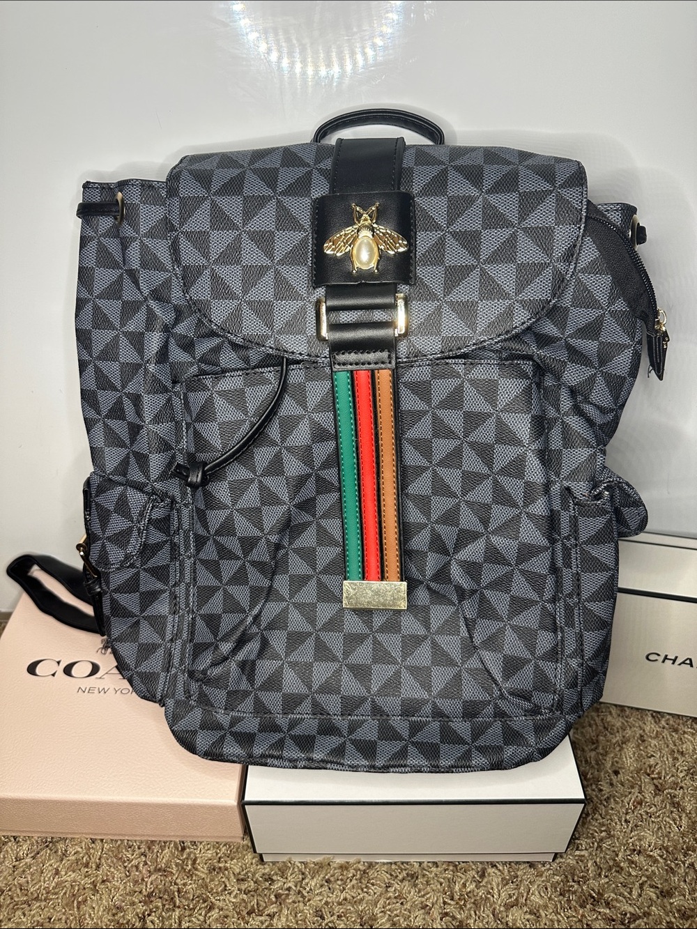 Men's Black Geometric Backpack with Bee Accent and Multicolor Stripe -